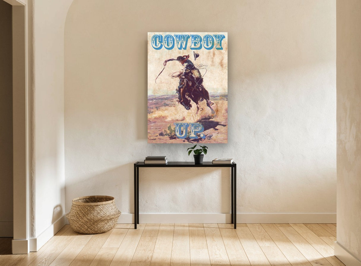 Cowboy Up Bronco vintage canvas print on the wall of a hallway