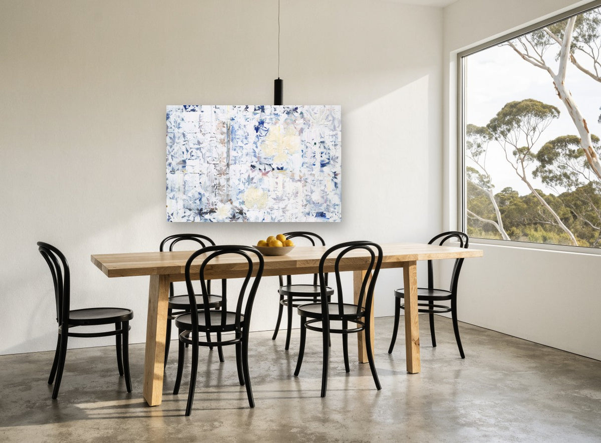 Faded Leaf Tiles floral canvas print on the wall of a dining room