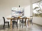 Harbour in White Light coastal canvas print on the wall of a dining room