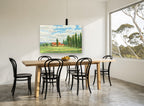 Poplars and Red Barn landscape canvas print on the wall of a dining room