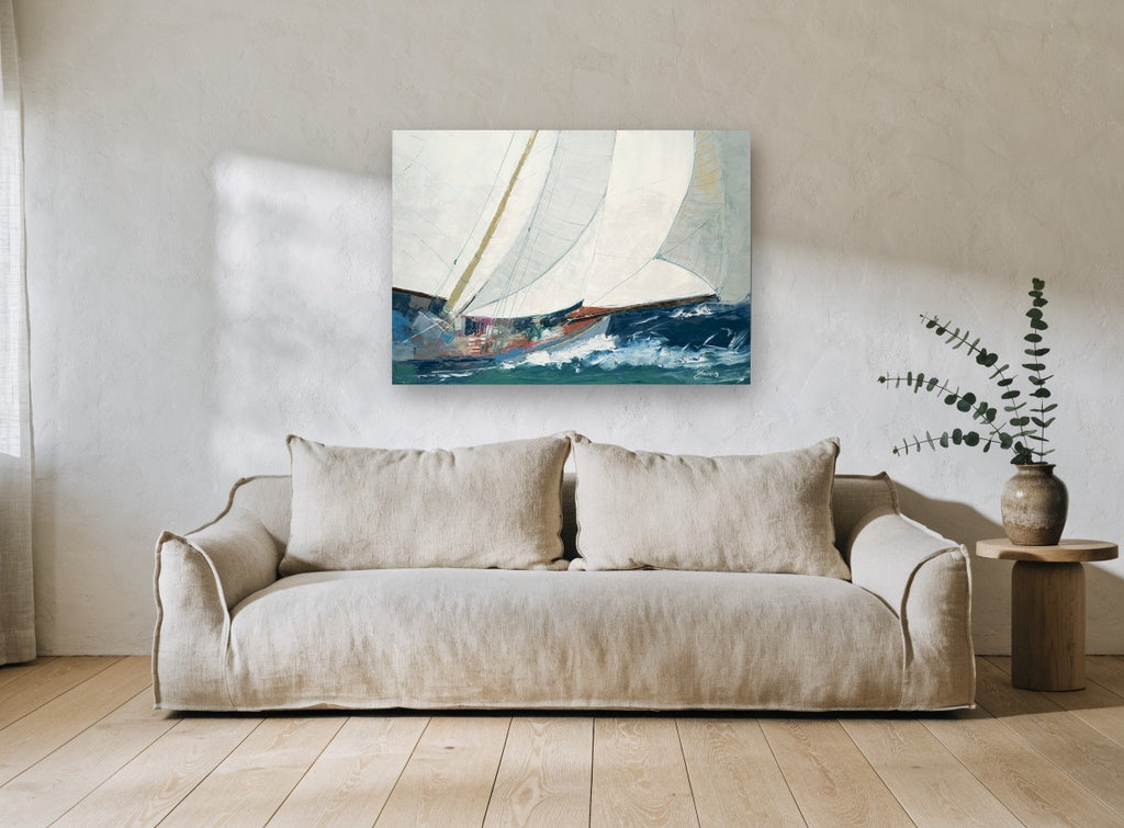 Heeling Under Full Sail coastal canvas print on the wall of a living room