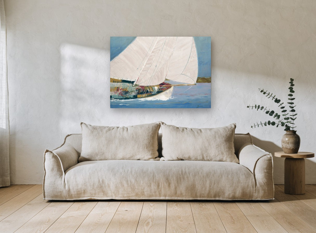 Sails Full Across Blue coastal canvas print on the wall of a living room