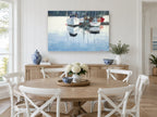 Still Harbour Moorings coastal canvas print on the wall of a Hamptons dining room