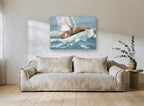 Heeling Into the Swell coastal canvas print on the wall of a living room