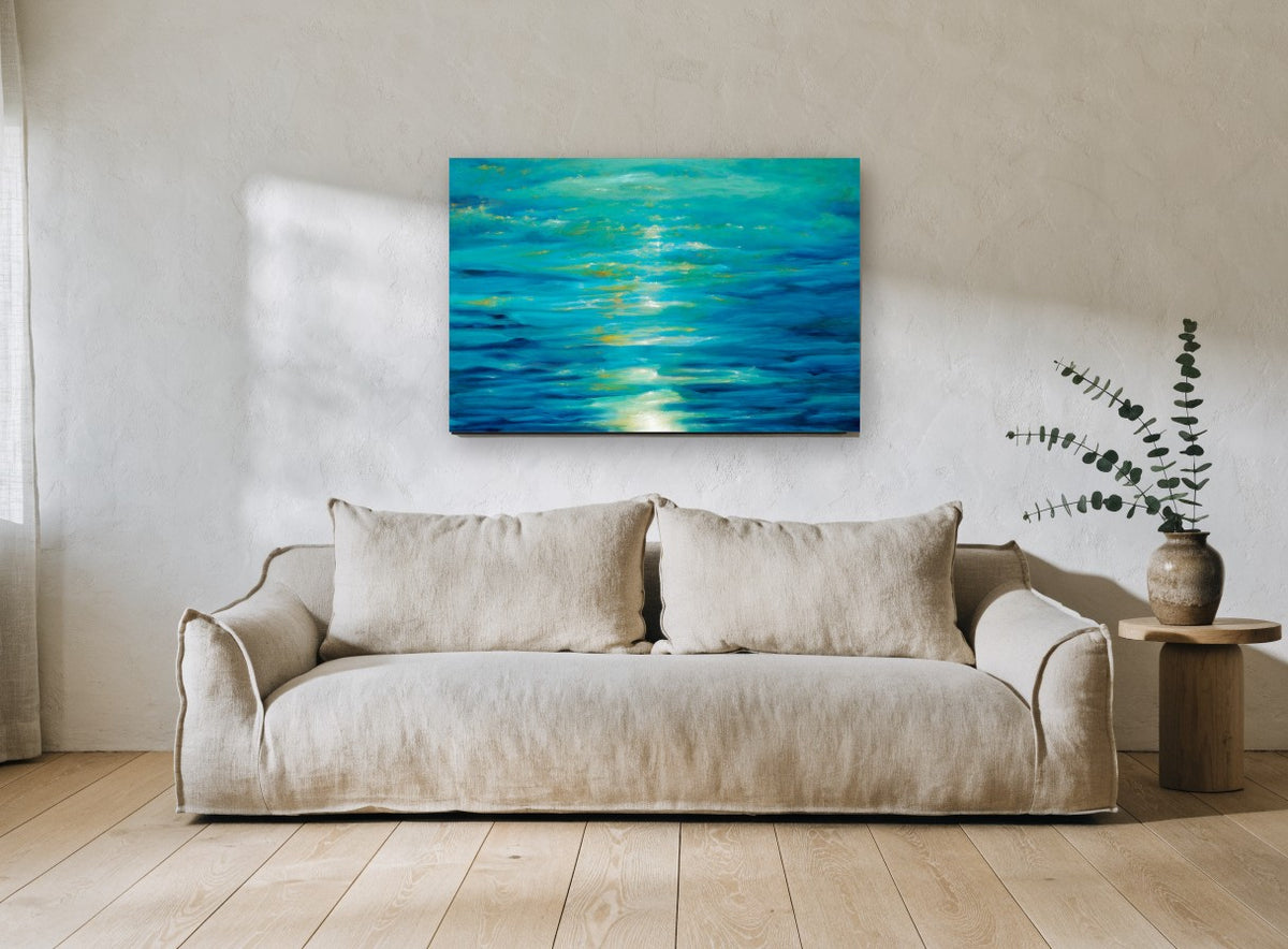 Moonlit Teal Shimmer coastal canvas print on the wall of a living room