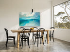 Three Sails Adrift coastal canvas print on the wall of a dining room