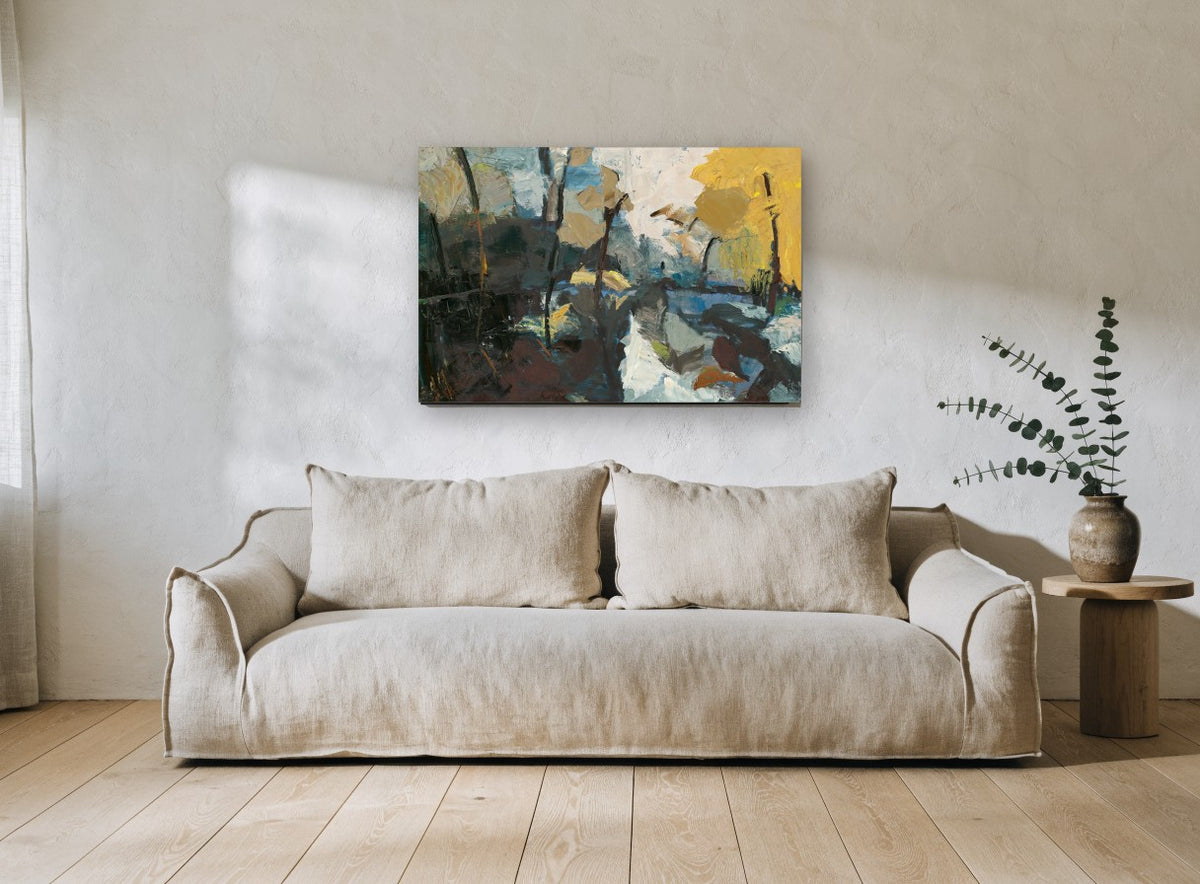 Golden Birch Thaw landscape canvas print on the wall of a living room