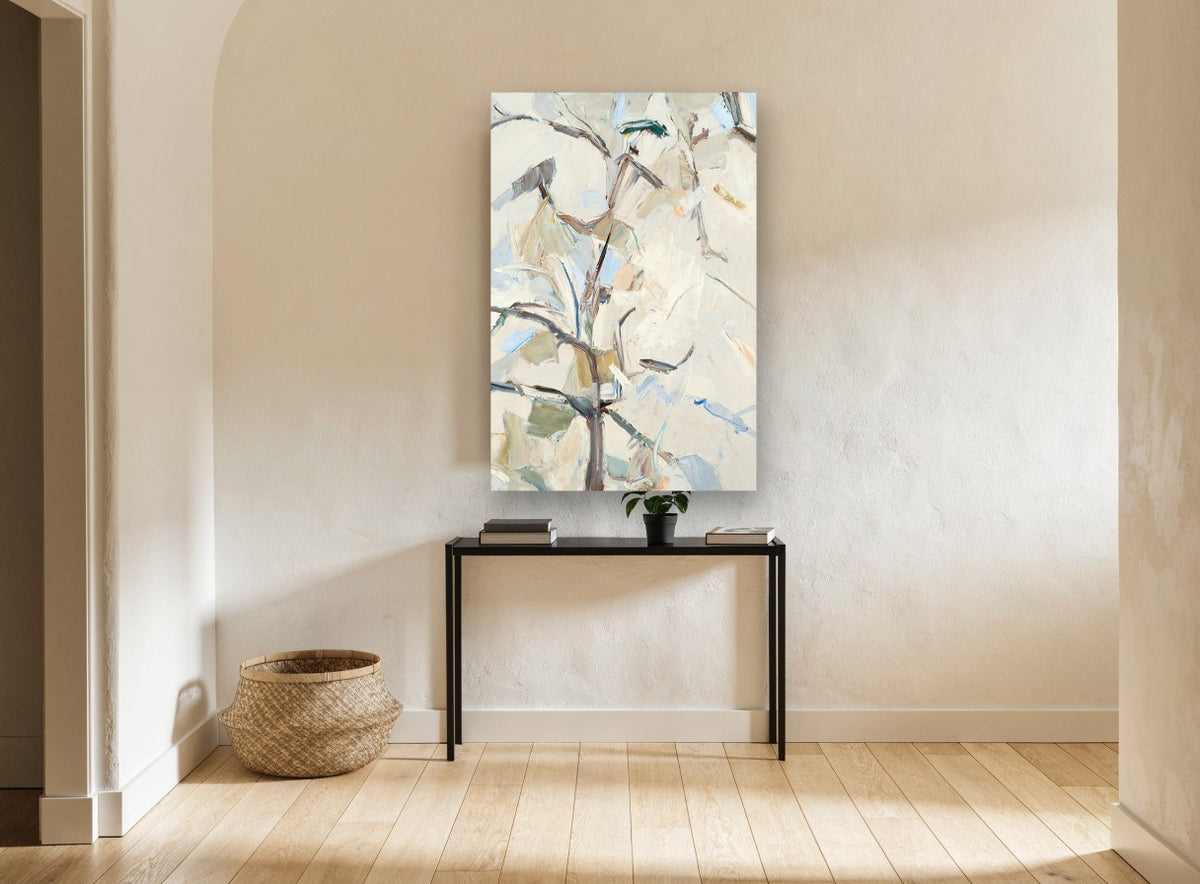 Pale Pear Branches floral canvas print on the wall of a hallway