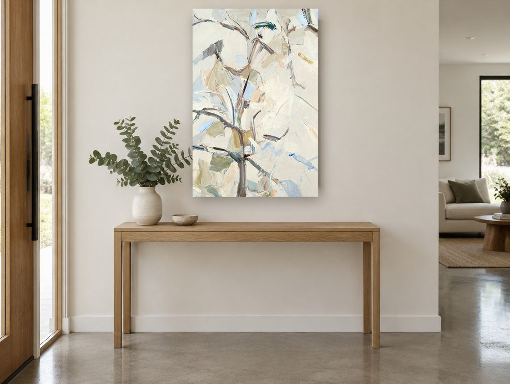 Pale Pear Branches floral canvas print on the wall of a entry hall