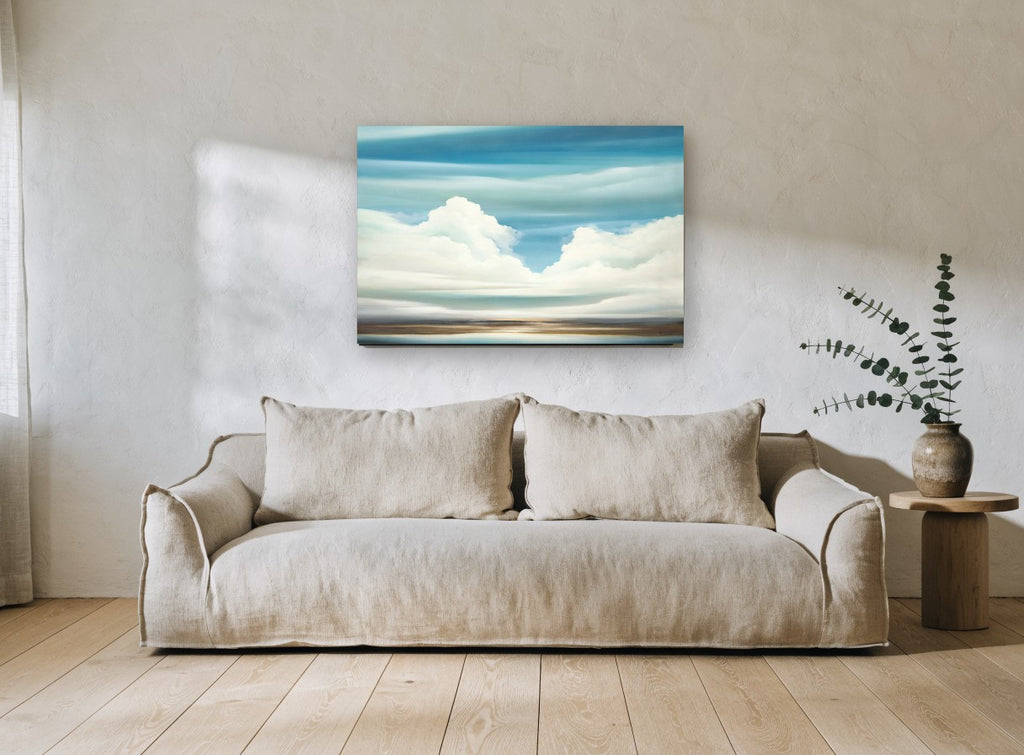 Cumulus Over Still Water coastal canvas print on the wall of a living room