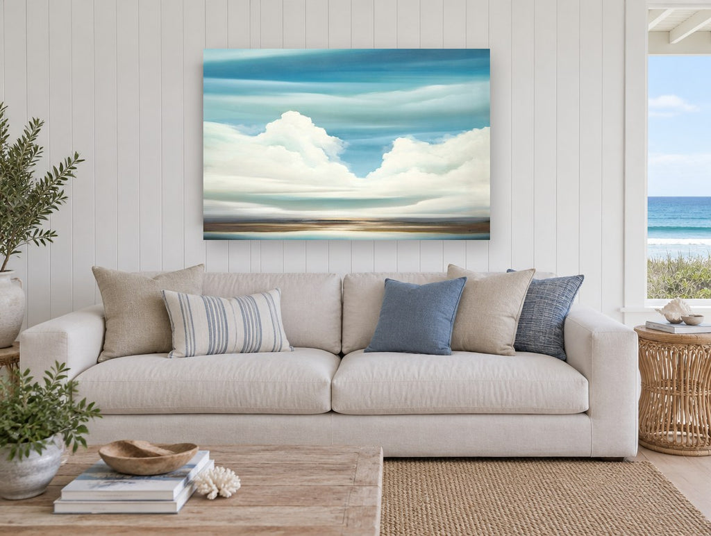 Cumulus Over Still Water coastal canvas print on the wall of a beach house living room