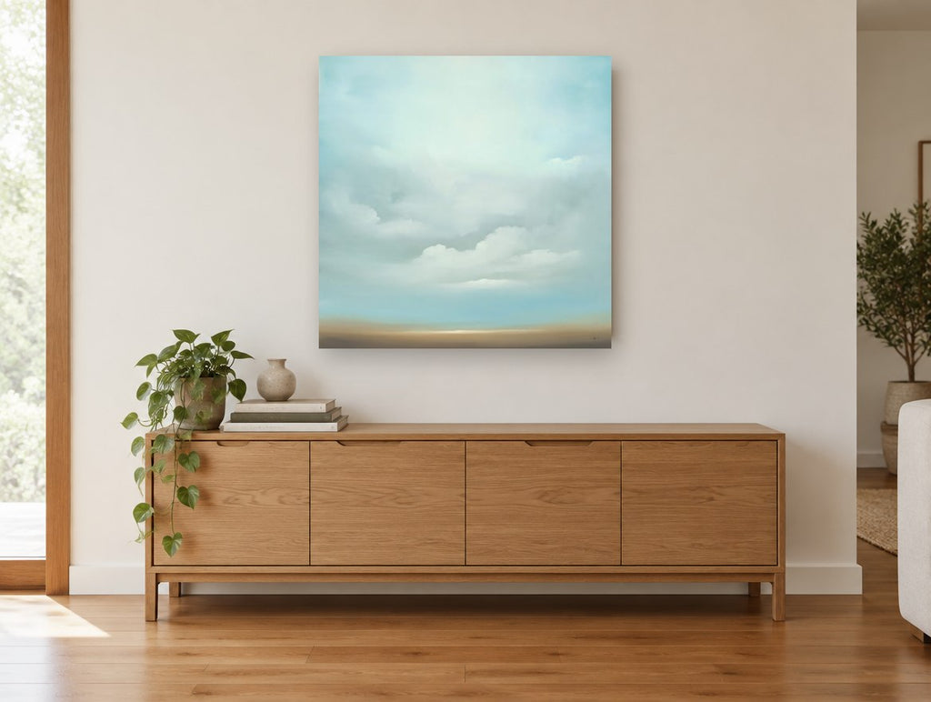 Soft Cloud Horizon landscape canvas print on the wall of a living room above a sideboard