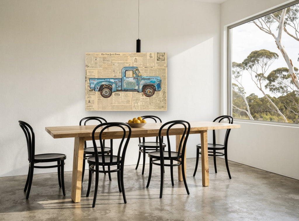 Blue Truck on Newsprint vintage canvas print on the wall of a dining room