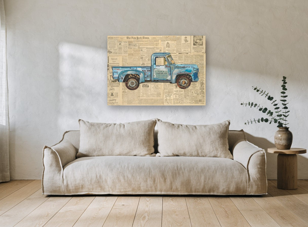 Blue Truck on Newsprint vintage canvas print on the wall of a living room
