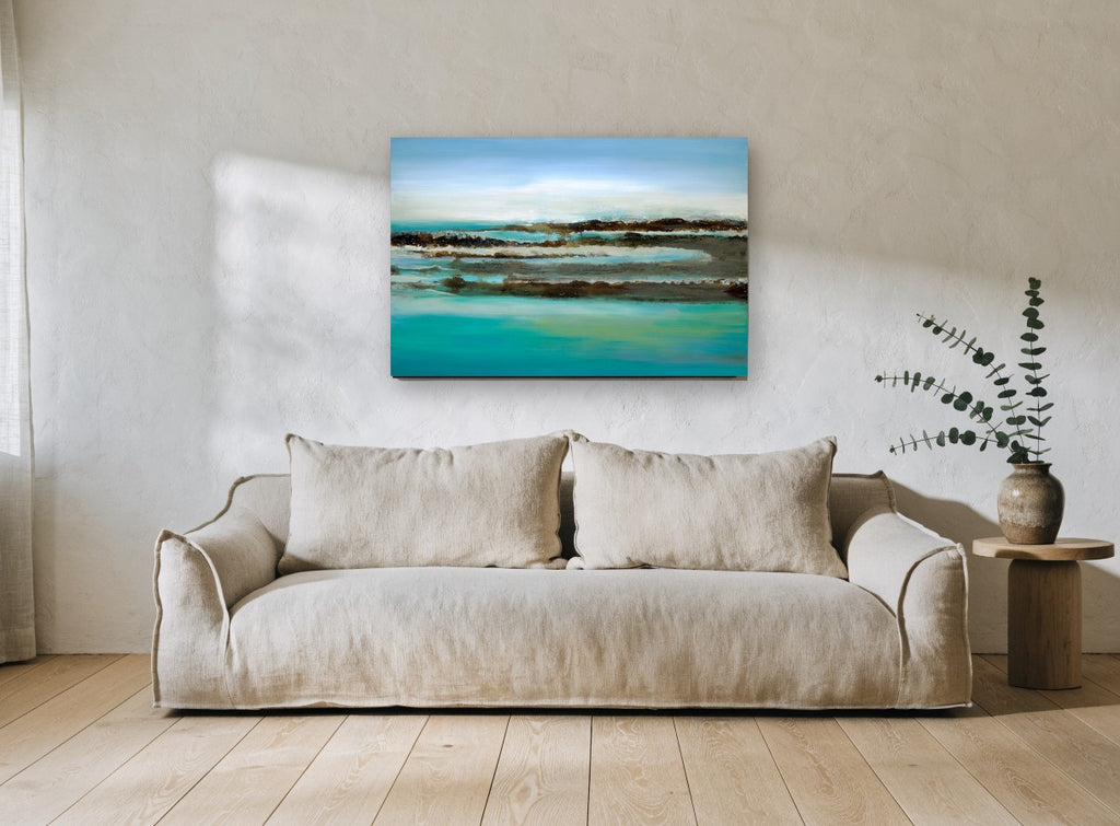Teal Shoreline Bands coastal canvas print on the wall of a living room
