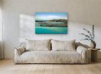 Teal Shoreline Bands coastal canvas print on the wall of a living room