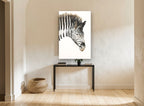 Inked Zebra Stripe Gaze animal canvas print on the wall of a hallway