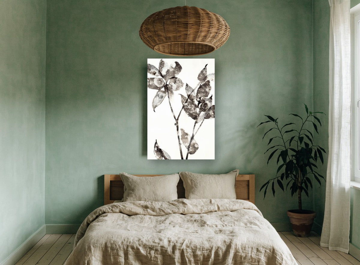 Mottled Ink Leaves floral canvas print on the wall of a bedroom