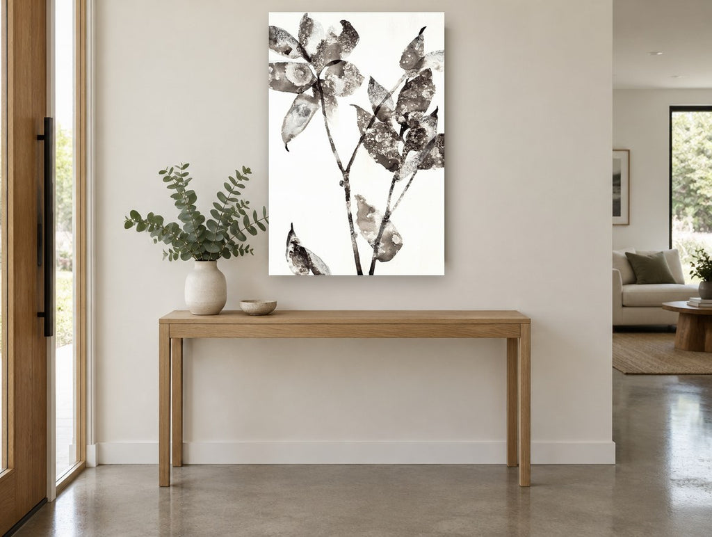 Mottled Ink Leaves floral canvas print on the wall of a entry hall