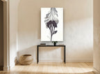 Inked Bloom Study floral canvas print on the wall of a hallway