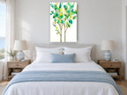 Leafy Green Saplings floral canvas print on the wall of a coastal bedroom