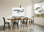 Humpback Drifting Free coastal canvas print on the wall of a dining room