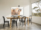 Fringe Over One Eye animal canvas print on the wall of a dining room