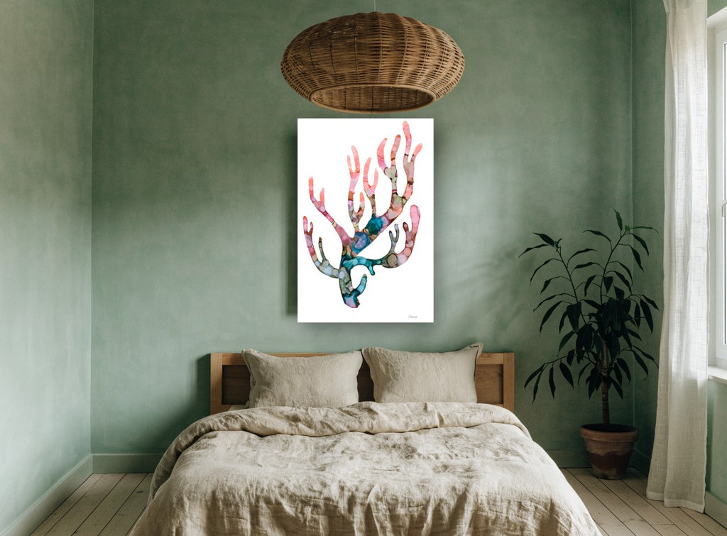 Blushing Coral Branch coastal canvas print on the wall of a bedroom