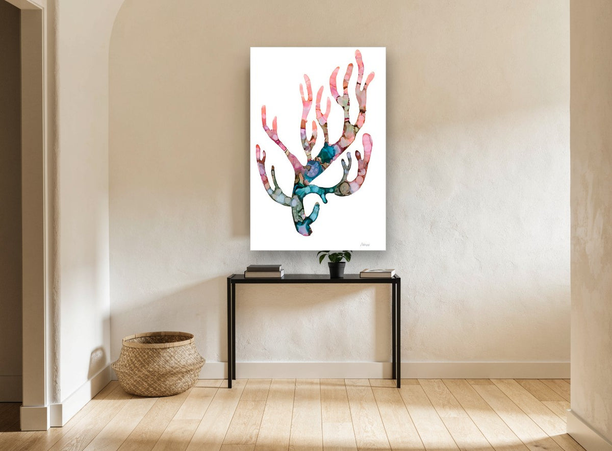 Blushing Coral Branch coastal canvas print on the wall of a hallway