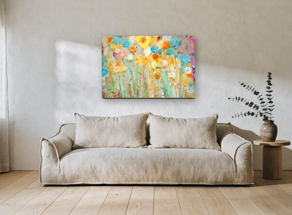 Sunlit Meadow Blooms floral canvas print on the wall of a living room
