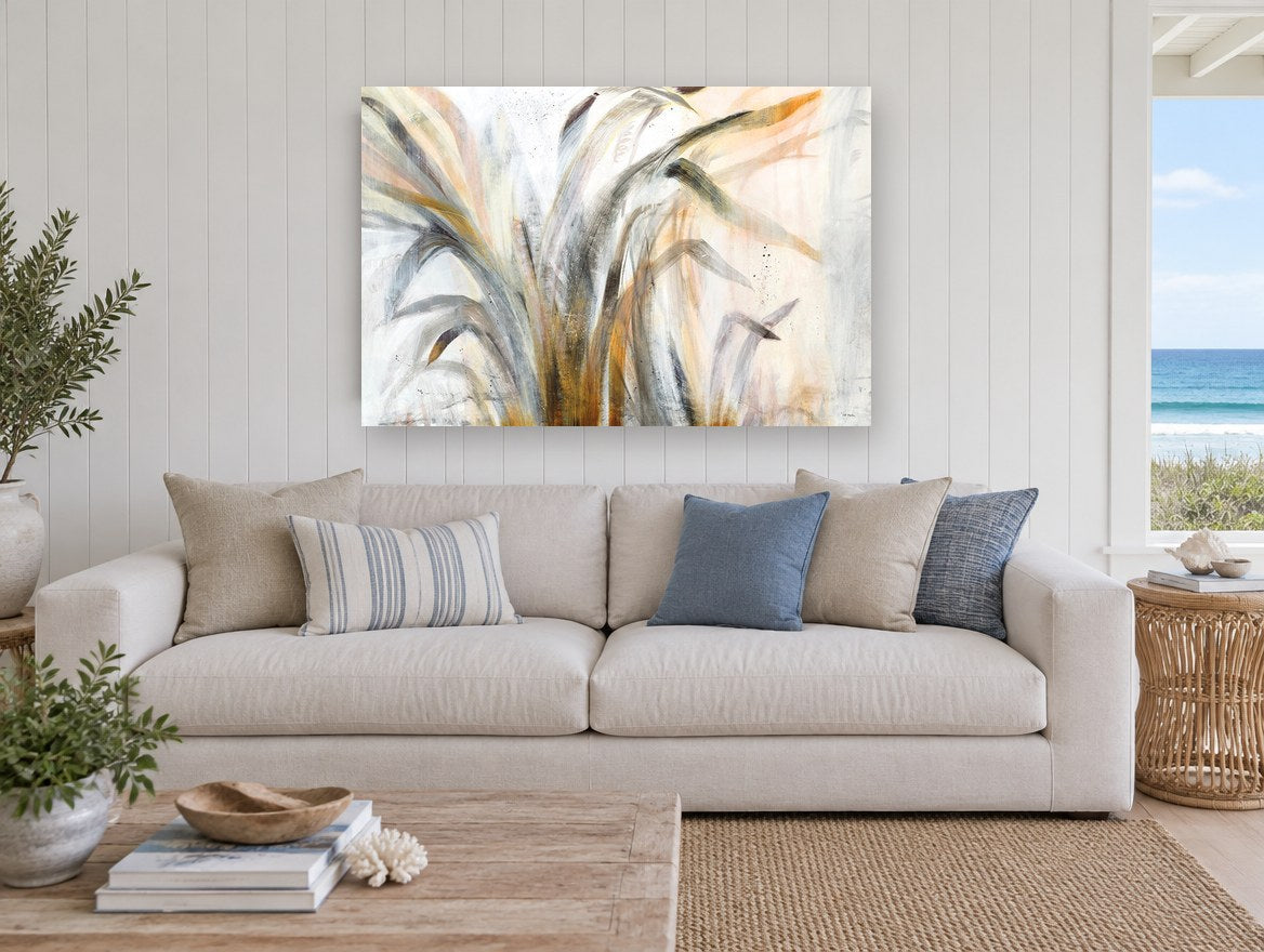 Windswept Grass Study floral canvas print on the wall of a beach house living room
