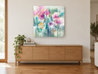 Soft Pink Garden floral canvas print on the wall of a living room above a sideboard