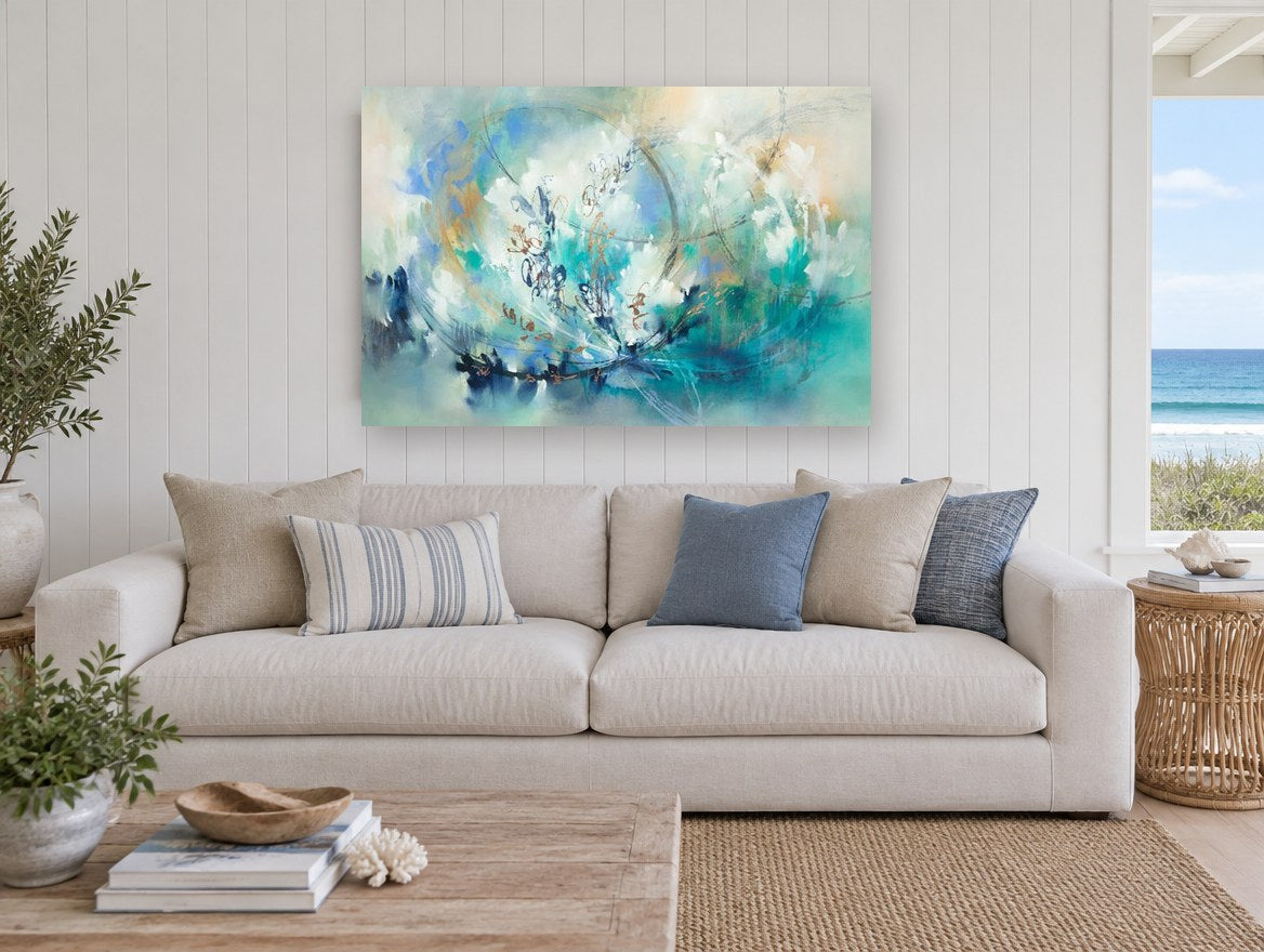 Teal Orbit Bloom floral canvas print on the wall of a beach house living room