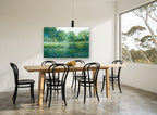 Misty Meadow Blooms floral canvas print on the wall of a dining room
