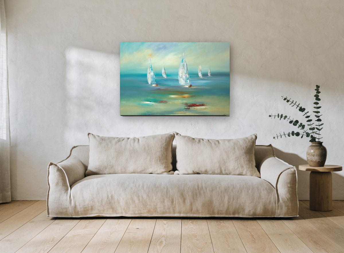 Sails on Teal Water coastal canvas print on the wall of a living room