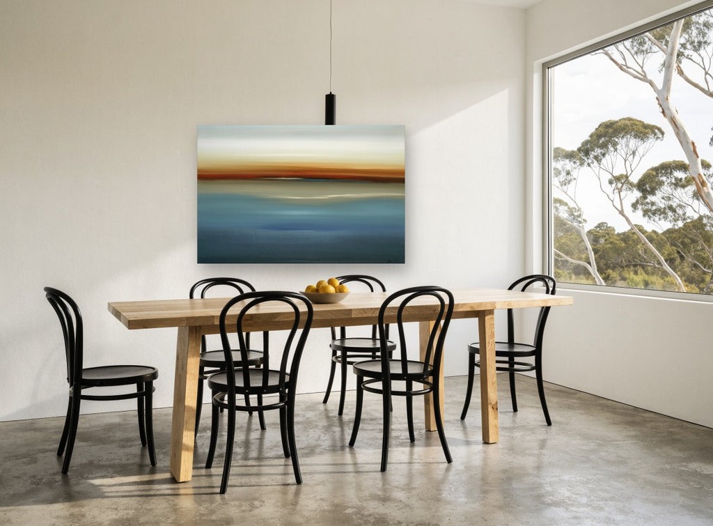 Blue Horizon Haze coastal canvas print on the wall of a dining room