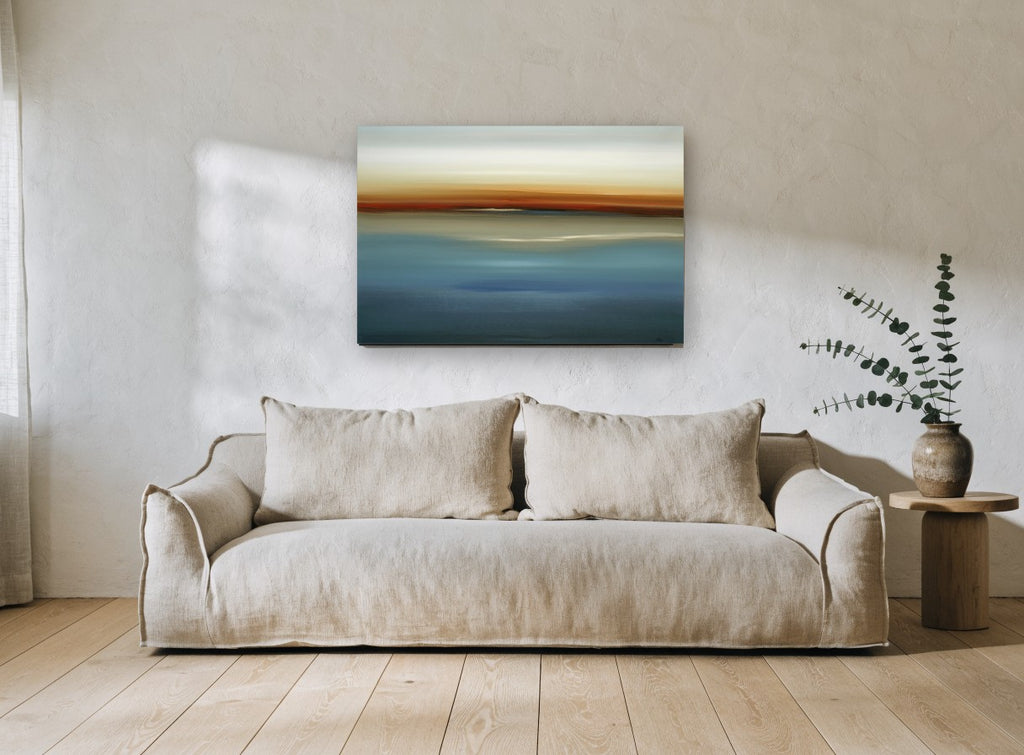 Blue Horizon Haze coastal canvas print on the wall of a living room