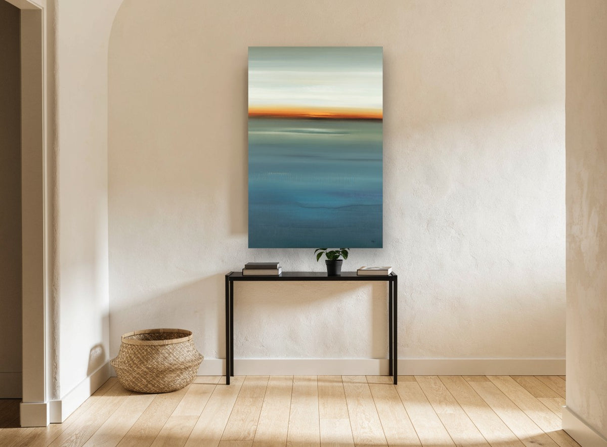 Blue Horizon Glow coastal canvas print on the wall of a hallway