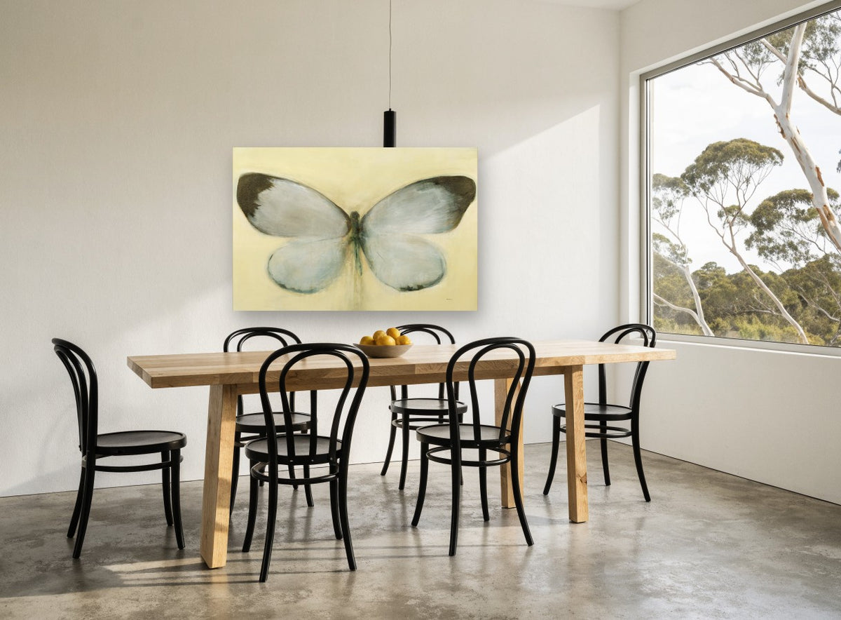 Pale Wing Study animal canvas print on the wall of a dining room