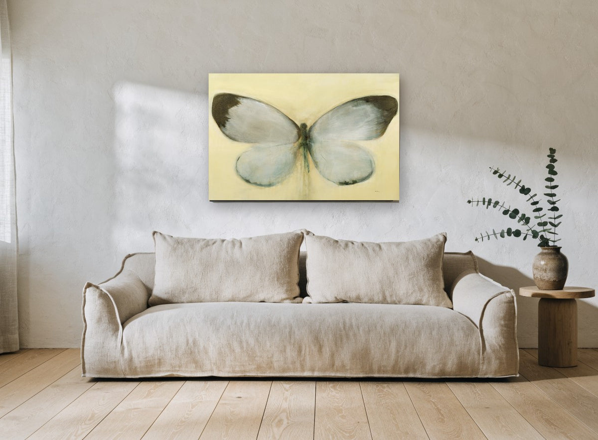 Pale Wing Study animal canvas print on the wall of a living room