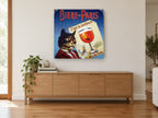 Beer Cat of Paris vintage canvas print on the wall of a living room above a sideboard