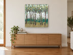 Teal Grove Clearing landscape canvas print on the wall of a living room above a sideboard