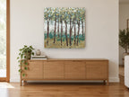 Teal Understorey Grove landscape canvas print on the wall of a living room above a sideboard
