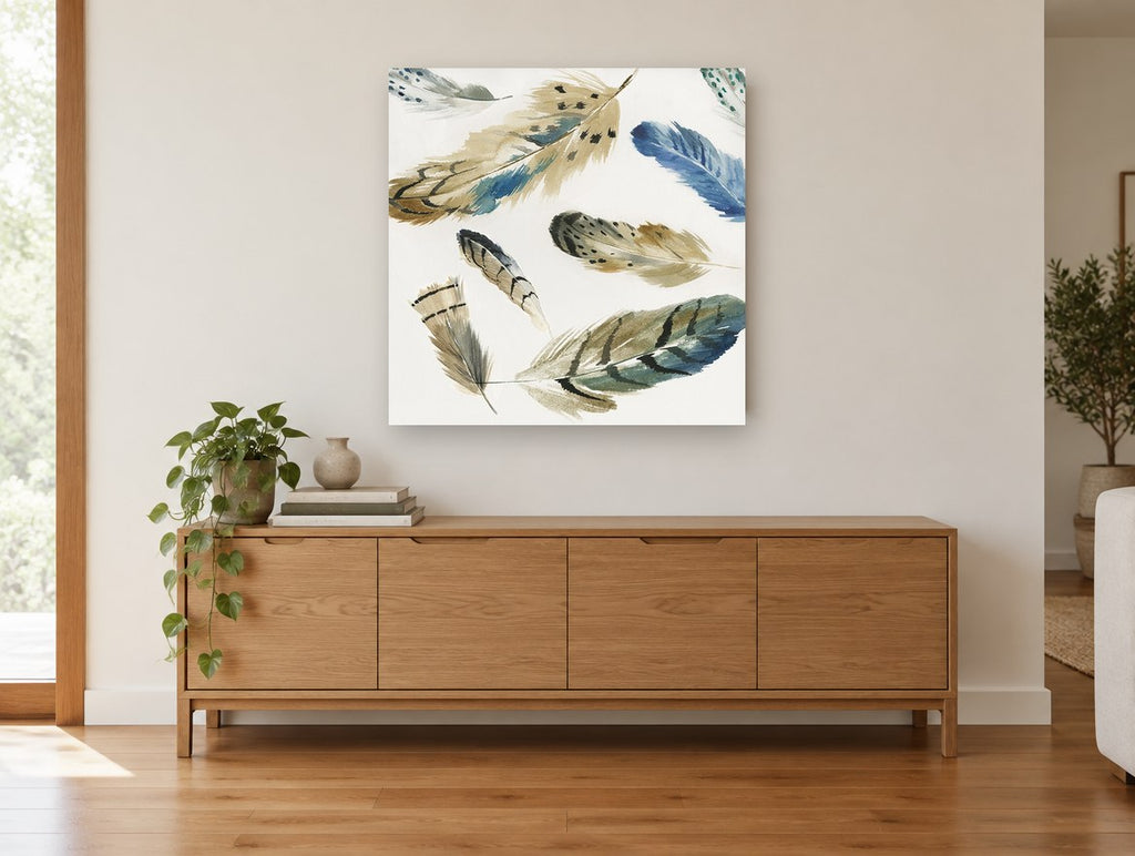 Scattered Feather Study animal canvas print on the wall of a living room above a sideboard
