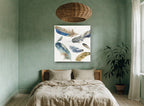 Drifting Blue Feathers animal canvas print on the wall of a bedroom