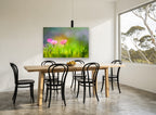 Cosmos in Green Meadow floral canvas print on the wall of a dining room