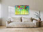 Meadow Pom Poms floral canvas print on the wall of a living room