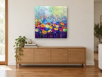 Daisy Field Bokeh floral canvas print on the wall of a living room above a sideboard