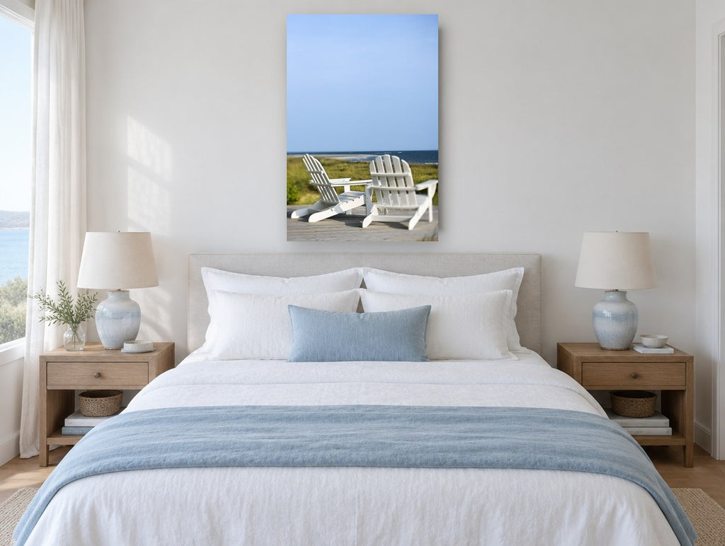 Two White Deck Chairs coastal canvas print on the wall of a coastal bedroom