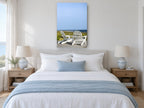 Two White Deck Chairs coastal canvas print on the wall of a coastal bedroom